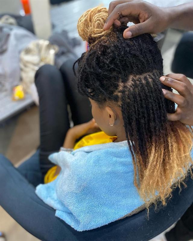 Colored locs transformation by Jacob Locs
